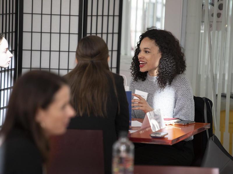 alum giving advice to a Barnard student at a Coffee Chats event